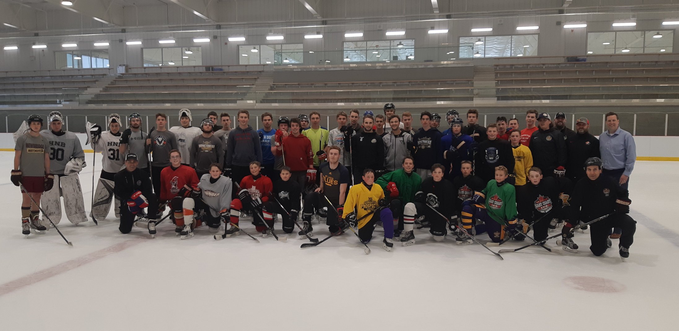 Coaches and players at 2019 Hockey school